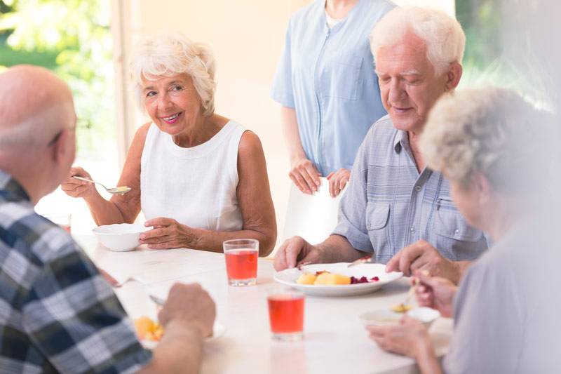 WLC residents eating and talking
