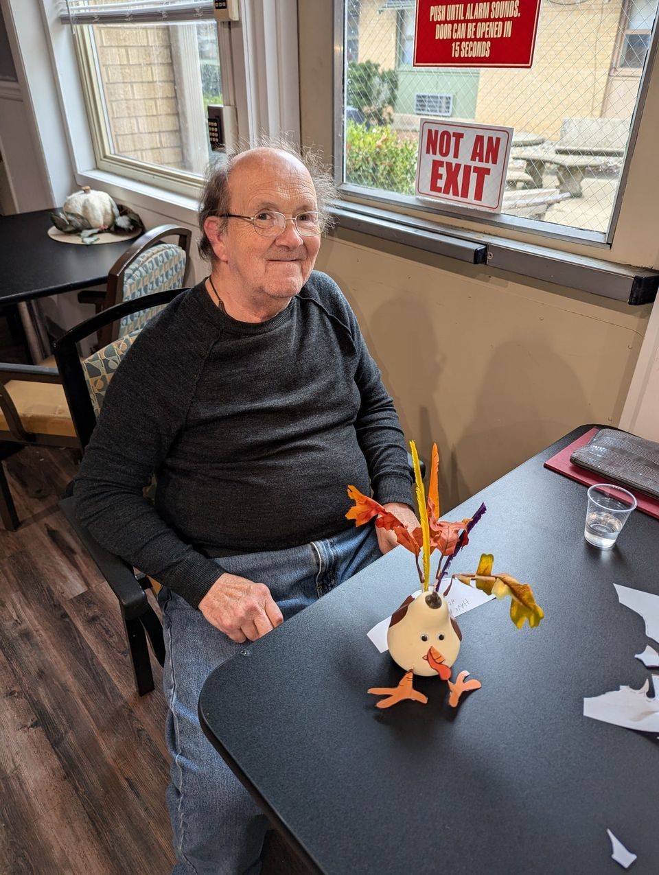 resident at alhambra enjoying thanksgiving turkey crafts